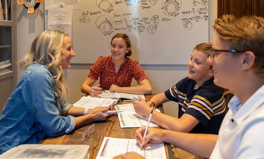 Family homeschooling around the table