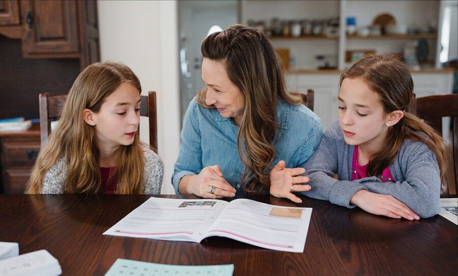 a homeschool mom teaching her two daughters